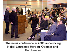 Chancellor Yang presents Nobel Laureates Alan Heeger and Herbert Kroemer to the press.